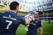 13 April 2024; James Lowe of Leinster with his son Nico and Will Connors after their side's victory in the Investec Champions Cup quarter-final match between Leinster and La Rochelle at the Aviva Stadium in Dublin. Photo by Harry Murphy/Sportsfile