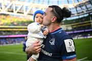13 April 2024; James Lowe of Leinster with his son Nico after his side's victory in the Investec Champions Cup quarter-final match between Leinster and La Rochelle at the Aviva Stadium in Dublin. Photo by Harry Murphy/Sportsfile