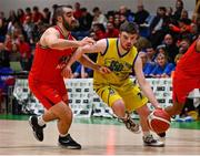 13 April 2024; Sean O'Flynn of UCD Marian in action against Elijah Faapito of Moy Tolka Rovers during the InsureMyVan.ie Division 1 play-off final match between UCD Marian and Moy Tolka Rovers at the National Basketball Arena in Tallaght, Dublin. Photo by Tyler Miller/Sportsfile