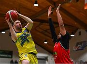 13 April 2024; Conor Meany of UCD Marian in action against DeWan White of Moy Tolka Rovers during the InsureMyVan.ie Division 1 play-off final match between UCD Marian and Moy Tolka Rovers at the National Basketball Arena in Tallaght, Dublin. Photo by Tyler Miller/Sportsfile
