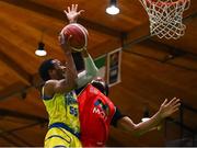 13 April 2024; Jonathon Jean of UCD Marian in action against DeWan White of Moy Tolka Rovers during the InsureMyVan.ie Division 1 play-off final match between UCD Marian and Moy Tolka Rovers at the National Basketball Arena in Tallaght, Dublin. Photo by Tyler Miller/Sportsfile