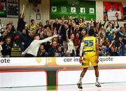 13 April 2024; Jonathon Jean of UCD Marian celebrates to supporters after scoring a three pointer during the InsureMyVan.ie Division 1 play-off final match between UCD Marian and Moy Tolka Rovers at the National Basketball Arena in Tallaght, Dublin. Photo by Tyler Miller/Sportsfile