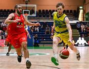13 April 2024; Matthew McGrath of UCD Marian in action against Elijah Faapito of Moy Tolka Rovers during the InsureMyVan.ie Division 1 play-off final match between UCD Marian and Moy Tolka Rovers at the National Basketball Arena in Tallaght, Dublin. Photo by Tyler Miller/Sportsfile