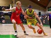 13 April 2024; Tobias Christensen of UCD Marian in action against Mark Convery of Moy Tolka Rovers during the InsureMyVan.ie Division 1 play-off final match between UCD Marian and Moy Tolka Rovers at the National Basketball Arena in Tallaght, Dublin. Photo by Tyler Miller/Sportsfile