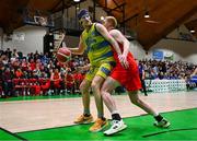 13 April 2024; Tobias Christensen of UCD Marian in action against Mark Convery of Moy Tolka Rovers during the InsureMyVan.ie Division 1 play-off final match between UCD Marian and Moy Tolka Rovers at the National Basketball Arena in Tallaght, Dublin. Photo by Tyler Miller/Sportsfile