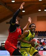 13 April 2024; Jonathon Jean of UCD Marian in action against DeWan White of Moy Tolka Rovers during the InsureMyVan.ie Division 1 play-off final match between UCD Marian and Moy Tolka Rovers at the National Basketball Arena in Tallaght, Dublin. Photo by Tyler Miller/Sportsfile