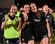 13 April 2024; Athlone Town players, from left, Madison Gibson, Kayleigh Shine, and Jesi Lynne Rossman celebrate after the SSE Airtricity Women's Premier Division match between Athlone Town and Peamount United at Athlone Town Stadium in Westmeath. Photo by Stephen McCarthy/Sportsfile