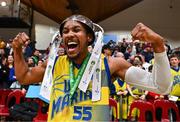 13 April 2024; Jonathon Jean of UCD Marian celebrates with the cup after the InsureMyVan.ie Division 1 play-off final match between UCD Marian and Moy Tolka Rovers at the National Basketball Arena in Tallaght, Dublin. Photo by Tyler Miller/Sportsfile