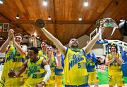 13 April 2024; Conor Meany of UCD Marian celebrates wit the cup after the InsureMyVan.ie Division 1 play-off final match between UCD Marian and Moy Tolka Rovers at the National Basketball Arena in Tallaght, Dublin. Photo by Tyler Miller/Sportsfile