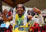 13 April 2024; Jonathon Jean of UCD Marian celebrates with the cup after the InsureMyVan.ie Division 1 play-off final match between UCD Marian and Moy Tolka Rovers at the National Basketball Arena in Tallaght, Dublin. Photo by Tyler Miller/Sportsfile