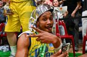13 April 2024; Jonathon Jean of UCD Marian celebrates with the cup after the InsureMyVan.ie Division 1 play-off final match between UCD Marian and Moy Tolka Rovers at the National Basketball Arena in Tallaght, Dublin. Photo by Tyler Miller/Sportsfile