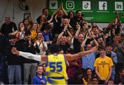 13 April 2024; Jonathon Jean of UCD Marian celebrates to supporters during the InsureMyVan.ie Division 1 play-off final match between UCD Marian and Moy Tolka Rovers at the National Basketball Arena in Tallaght, Dublin. Photo by Tyler Miller/Sportsfile