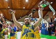 13 April 2024; Conor Meany of UCD Marian celebrates wit the cup after the InsureMyVan.ie Division 1 play-off final match between UCD Marian and Moy Tolka Rovers at the National Basketball Arena in Tallaght, Dublin. Photo by Tyler Miller/Sportsfile