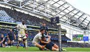 13 April 2024; James Lowe of Leinster is held up by Antoine Hastoy of La Rochelle during the Investec Champions Cup quarter-final match between Leinster and La Rochelle at the Aviva Stadium in Dublin. Photo by Harry Murphy/Sportsfile