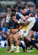 13 April 2024; Joe McCarthy of Leinster is tackled by Jack Nowell of La Rochelle during the Investec Champions Cup quarter-final match between Leinster and La Rochelle at the Aviva Stadium in Dublin. Photo by Harry Murphy/Sportsfile