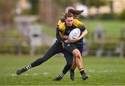 14 April 2024; Lucy Mangan of Garda is tackled by Sophie Murphy of Newbridge during the Women's Division 5 Plate final match between Newbridge and Garda during the Bank of Ireland Leinster Rugby Women Finals Day at Balbriggan RFC in Dublin. Photo by Ben McShane/Sportsfile