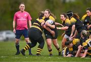 14 April 2024; Megan O'Callaghan of Garda is tackled by Charlotte Connolly of Newbridge during the Women's Division 5 Plate final match between Newbridge and Garda during the Bank of Ireland Leinster Rugby Women Finals Day at Balbriggan RFC in Dublin. Photo by Ben McShane/Sportsfile