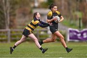 14 April 2024; Ciara McDermott of Garda is tackled by Sorcha Whelan of Newbridge during the Women's Division 5 Plate final match between Newbridge and Garda during the Bank of Ireland Leinster Rugby Women Finals Day at Balbriggan RFC in Dublin. Photo by Ben McShane/Sportsfile