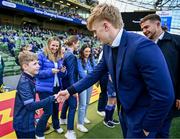 13 April 2024; Matchday mascot Daragh De Búrca meets Leinster player Tommy O'Brien before the Investec Champions Cup quarter-final match between Leinster and La Rochelle at the Aviva Stadium in Dublin. Photo by Harry Murphy/Sportsfile