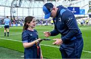 13 April 2024; Matchday mascot Avery Tuite has her programme signed by Garry Ringrose of Leinster before the Investec Champions Cup quarter-final match between Leinster and La Rochelle at the Aviva Stadium in Dublin. Photo by Harry Murphy/Sportsfile