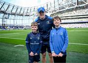 13 April 2024; Matchday mascot Daragh De Búrca with Garry Ringrose of Leinster before the Investec Champions Cup quarter-final match between Leinster and La Rochelle at the Aviva Stadium in Dublin. Photo by Harry Murphy/Sportsfile