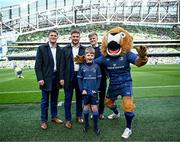 13 April 2024; Matchday mascot Avery Tuite with Leinster players Rob Russell, Scott Penny, Tommy O'Brien and Leo the Lion before the Investec Champions Cup quarter-final match between Leinster and La Rochelle at the Aviva Stadium in Dublin. Photo by Harry Murphy/Sportsfile