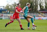 13 April 2024; Shauna Fox of Shamrock Rovers in action against Rebecca Devereux of Shelbourne during the SSE Airtricity Women's Premier Division match between Shelbourne and Shamrock Rovers at Tolka Park in Dublin. Photo by Stephen McCarthy/Sportsfile