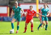 13 April 2024; Shauna Fox of Shamrock Rovers in action against Noelle Murray of Shelbourne during the SSE Airtricity Women's Premier Division match between Shelbourne and Shamrock Rovers at Tolka Park in Dublin. Photo by Stephen McCarthy/Sportsfile