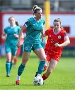 13 April 2024; Shauna Fox of Shamrock Rovers in action against Rebecca Devereux of Shelbourne during the SSE Airtricity Women's Premier Division match between Shelbourne and Shamrock Rovers at Tolka Park in Dublin. Photo by Stephen McCarthy/Sportsfile