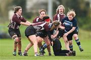 14 April 2024; Ciara Quinn of Navan is tackled by Sarah Breslin of Roscrea during the Women's Division 5 Cup final match between Navan and Roscrea during the Bank of Ireland Leinster Rugby Women Finals Day at Balbriggan RFC in Dublin. Photo by Ben McShane/Sportsfile