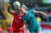 13 April 2024; Shauna Fox of Shamrock Rovers in action against Jess Garagan of Shelbourne during the SSE Airtricity Women's Premier Division match between Shelbourne and Shamrock Rovers at Tolka Park in Dublin. Photo by Stephen McCarthy/Sportsfile