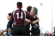 14 April 2024; Rachel Palmer of Roscrea celebrates with teammates, Eimear Gleeson, behind, and Sarah Breslin, left, after scoring a try during the Women's Division 5 Cup final match between Navan and Roscrea during the Bank of Ireland Leinster Rugby Women Finals Day at Balbriggan RFC in Dublin. Photo by Ben McShane/Sportsfile