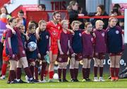 13 April 2024; Jemma Quinn of Shelbourne poses for a photograph with young players from Killester Donnycarney after the SSE Airtricity Women's Premier Division match between Shelbourne and Shamrock Rovers at Tolka Park in Dublin. Photo by Stephen McCarthy/Sportsfile