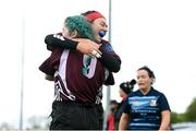14 April 2024; Rachel Palmer of Roscrea celebrates with teammate Sarah Breslin, left, after scoring a try during the Women's Division 5 Cup final match between Navan and Roscrea during the Bank of Ireland Leinster Rugby Women Finals Day at Balbriggan RFC in Dublin. Photo by Ben McShane/Sportsfile