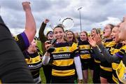 14 April 2024; Player of the match Molly Cassidy of Newbridge, centre, leads the celebrations with her teammates after their victory in the Women's Division 5 Plate final match between Newbridge and Garda during the Bank of Ireland Leinster Rugby Women Finals Day at Balbriggan RFC in Dublin. Photo by Ben McShane/Sportsfile