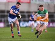 13 April 2024; Mark Barry of Laois in action against David Dempsey of Offaly during the Leinster GAA Football Senior Championship quarter-final match between Offaly and Laois at Laois Hire O’Moore Park in Portlaoise, Laois. Photo by Piaras Ó Mídheach/Sportsfile