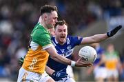 13 April 2024; Nathan Poland of Offaly in action against Eoin Lowry of Laois during the Leinster GAA Football Senior Championship quarter-final match between Offaly and Laois at Laois Hire O’Moore Park in Portlaoise, Laois. Photo by Piaras Ó Mídheach/Sportsfile