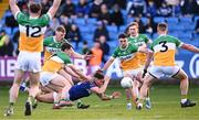 13 April 2024; Kevin Swayne of Laois in action against Offaly players, from left, Jordan Hayes, 12, David Dempsey, 4, John Furlong, Ruairí McNamee, 11, Cormac Egan and Declan Hogan, 3, during the Leinster GAA Football Senior Championship quarter-final match between Offaly and Laois at Laois Hire O’Moore Park in Portlaoise, Laois. Photo by Piaras Ó Mídheach/Sportsfile