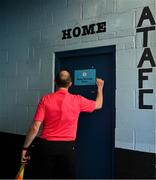 13 April 2024; Assistant referee Conor Fitzgibbon knocks on the Athlone Town dressing room door before the SSE Airtricity Women's Premier Division match between Athlone Town and Peamount United at Athlone Town Stadium in Westmeath. Photo by Stephen McCarthy/Sportsfile