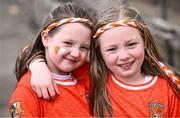 14 April 2024; Armagh supporters Erin, age 6, left, and Grace Hughes, age 9, from Portadown, before the Ulster GAA Football Senior Championship quarter-final match between Fermanagh and Armagh at Brewster Park in Enniskillen, Fermanagh. Photo by Ramsey Cardy/Sportsfile
