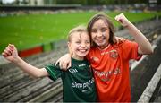 14 April 2024; Armagh supporters Niamh McKenna, age 8, left, and Lily McDowell, age 9, from Lurgan, before the Ulster GAA Football Senior Championship quarter-final match between Fermanagh and Armagh at Brewster Park in Enniskillen, Fermanagh. Photo by Ramsey Cardy/Sportsfile