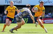 13 April 2024; James Hume of Ulster in action against Leon Darricarrere of Clermont during the EPCR Challenge Cup quarter-final match between Clermont Auvergne and Ulster at Stade Marcel Michelin in Clermont, France. Photo by John Dickson/Sportsfile