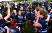 14 April 2024; Navan captain Paula Keating celebrates with the cup and her teammates after their side's victory in the Women's Division 5 Cup final match between Navan and Roscrea during the Bank of Ireland Leinster Rugby Women Finals Day at Balbriggan RFC in Dublin. Photo by Ben McShane/Sportsfile