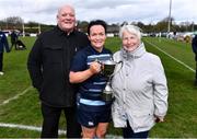 14 April 2024; Navan captain Paula Keating, centre, celebrates with her parents Bob and Ellen after her side's victory in the Women's Division 5 Cup final match between Navan and Roscrea during the Bank of Ireland Leinster Rugby Women Finals Day at Balbriggan RFC in Dublin. Photo by Ben McShane/Sportsfile