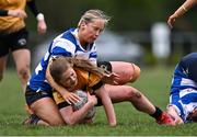 14 April 2024; Siafra Ni Bhriain of Ashbourne is tackled by Sinead Ryan of Athy during the Cusack Plate final match between Athy and Ashbourne during the Bank of Ireland Leinster Rugby Women Finals Day at Balbriggan RFC in Dublin. Photo by Ben McShane/Sportsfile
