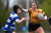 14 April 2024; Naoise Smyth of Ashbourne is tackled by Liz Brophy of Athy during the Cusack Plate final match between Athy and Ashbourne during the Bank of Ireland Leinster Rugby Women Finals Day at Balbriggan RFC in Dublin. Photo by Ben McShane/Sportsfile