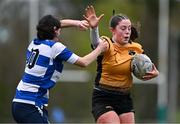 14 April 2024; Naoise Smyth of Ashbourne is tackled by Liz Brophy of Athy during the Cusack Plate final match between Athy and Ashbourne during the Bank of Ireland Leinster Rugby Women Finals Day at Balbriggan RFC in Dublin. Photo by Ben McShane/Sportsfile