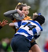 14 April 2024; Ciara Lee-Jenkinson of Ashbourne is tackled by Sarah Hendy of Athy during the Cusack Plate final match between Athy and Ashbourne during the Bank of Ireland Leinster Rugby Women Finals Day at Balbriggan RFC in Dublin. Photo by Ben McShane/Sportsfile