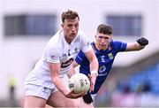 14 April 2024; Darragh Kirwan of Kildare in action against Tom Moran of Wicklow during the Leinster GAA Football Senior Championship quarter-final match between Kildare and Wicklow at Laois Hire O’Moore Park in Portlaoise, Laois. Photo by Piaras Ó Mídheach/Sportsfile