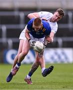 14 April 2024; Jonathan Carlin of Wicklow in action against Darragh Kirwan of Kildare during the Leinster GAA Football Senior Championship quarter-final match between Kildare and Wicklow at Laois Hire O’Moore Park in Portlaoise, Laois. Photo by Piaras Ó Mídheach/Sportsfile
